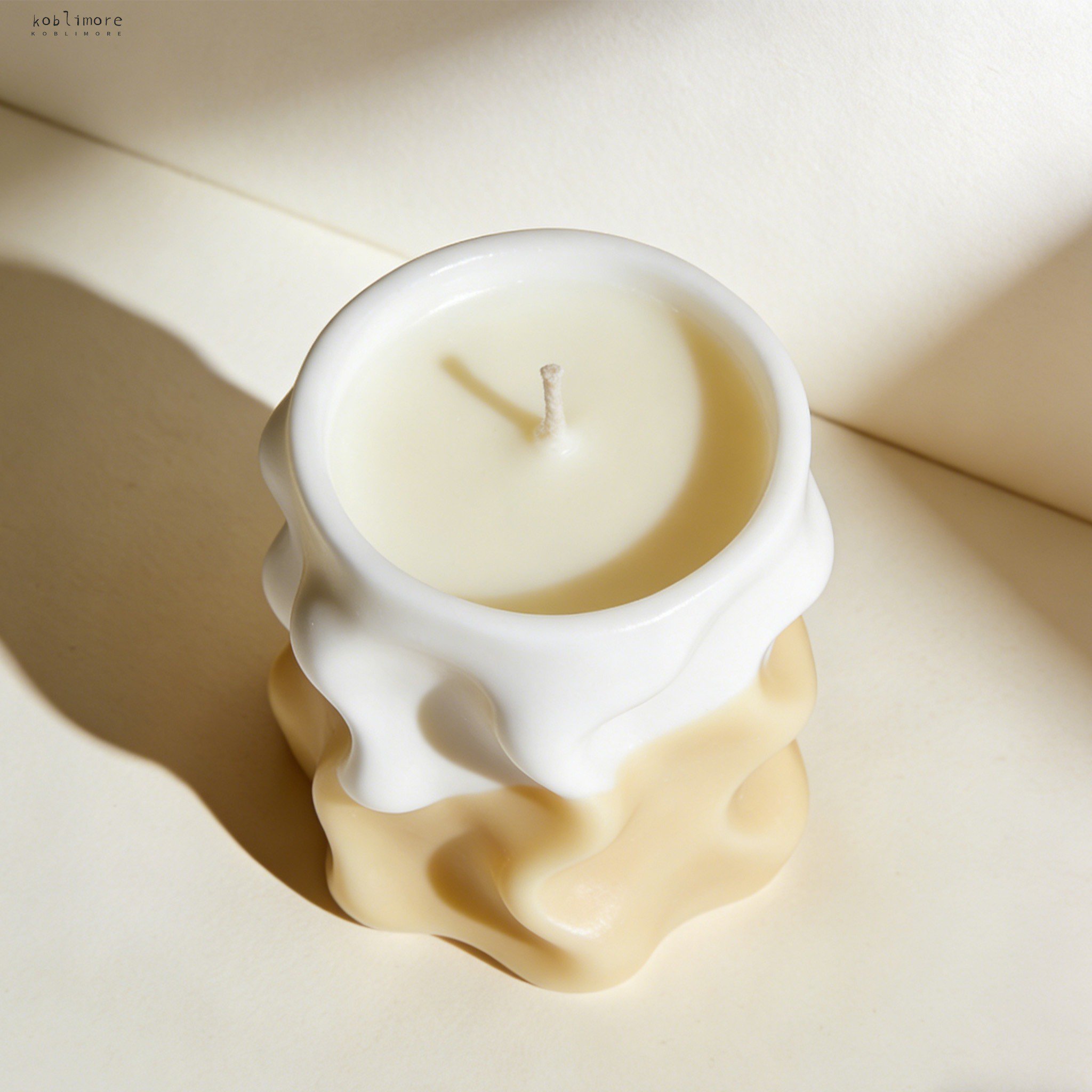 Three assorted scented candles displayed together