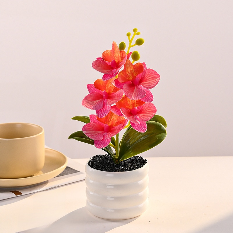 Arreglo de orquídea artificial en maceta