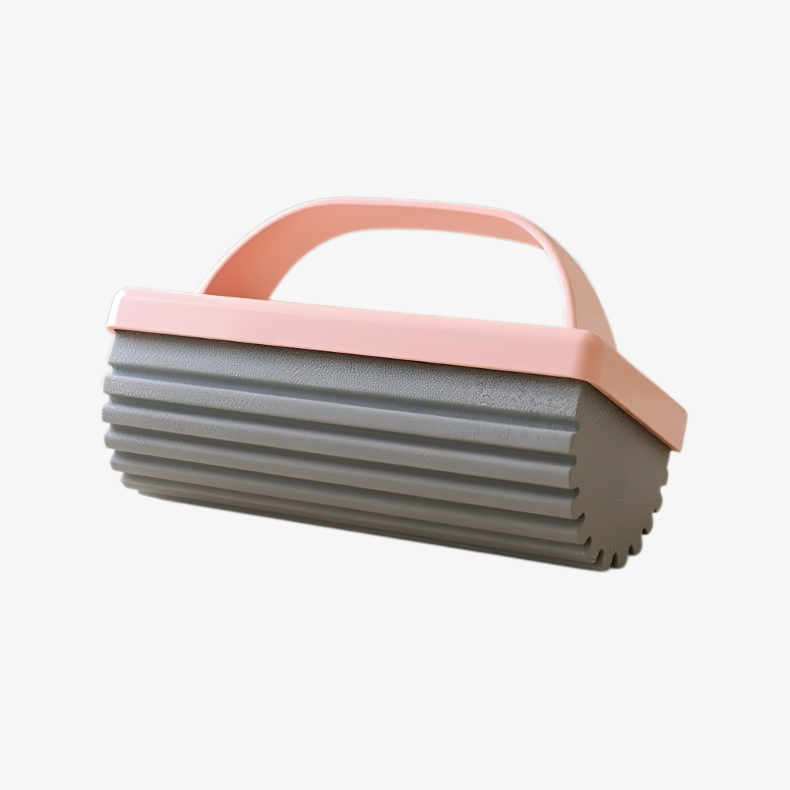 Trapeador portátil limpiando mesa de cocina
