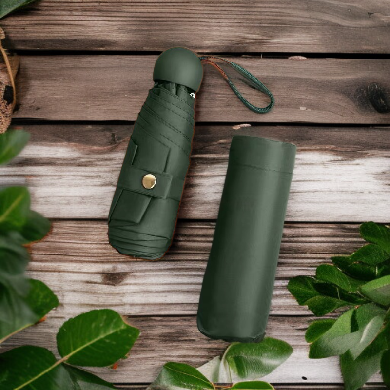 Compact foldable capsule umbrella suitable for both sunny and rainy days.