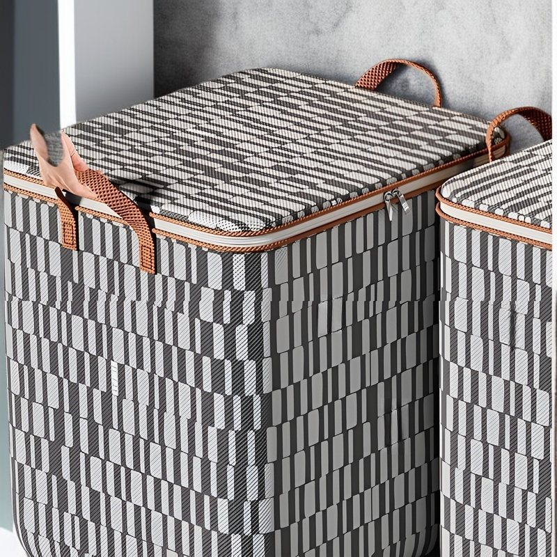 Bolsa organizadora con asas reforzadas, ideal para cambios de temporada y mudanzas