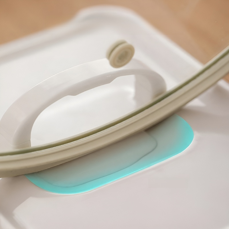 Compact folding pot lid organizer in use