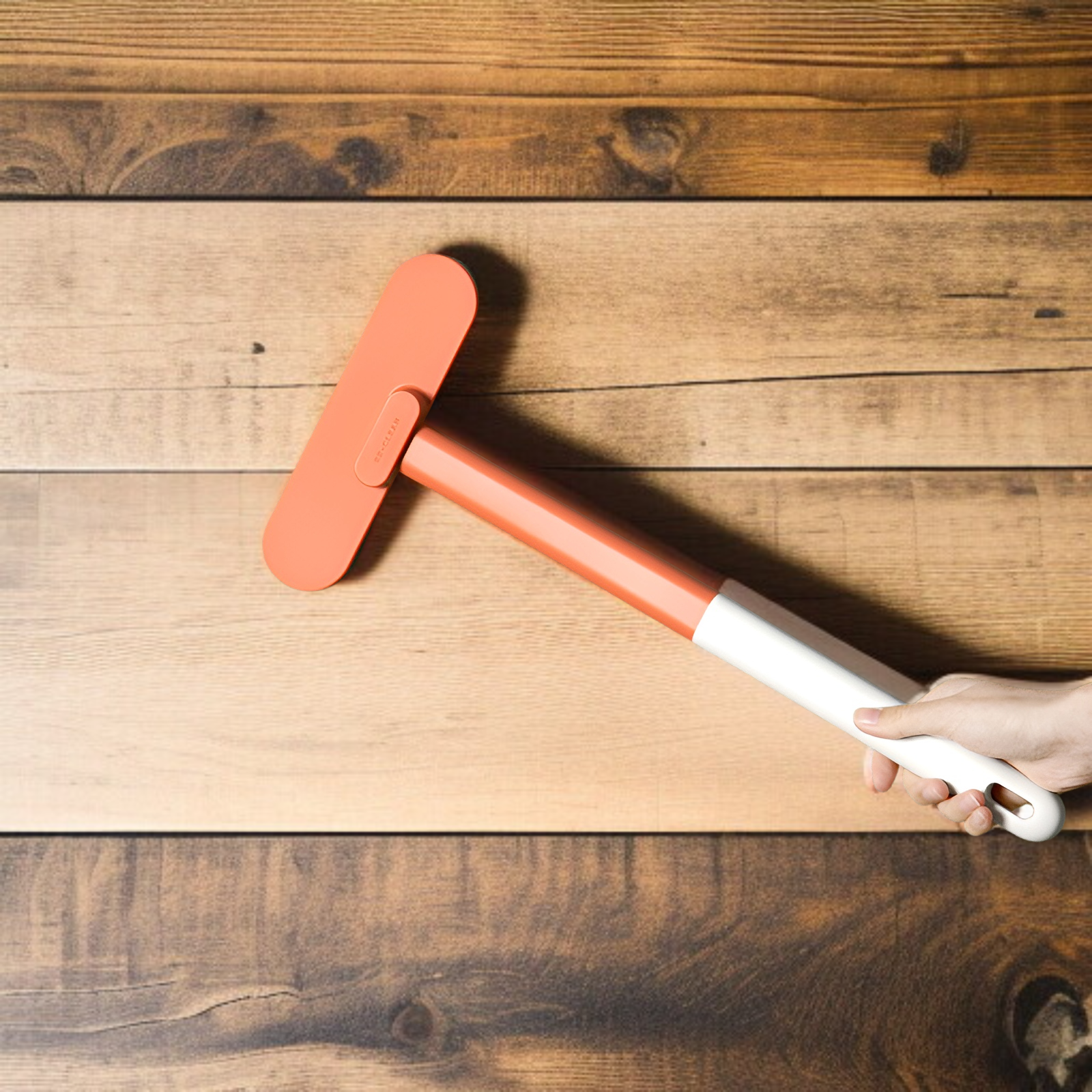 Wide surface lint brush cleaning a fabric sofa