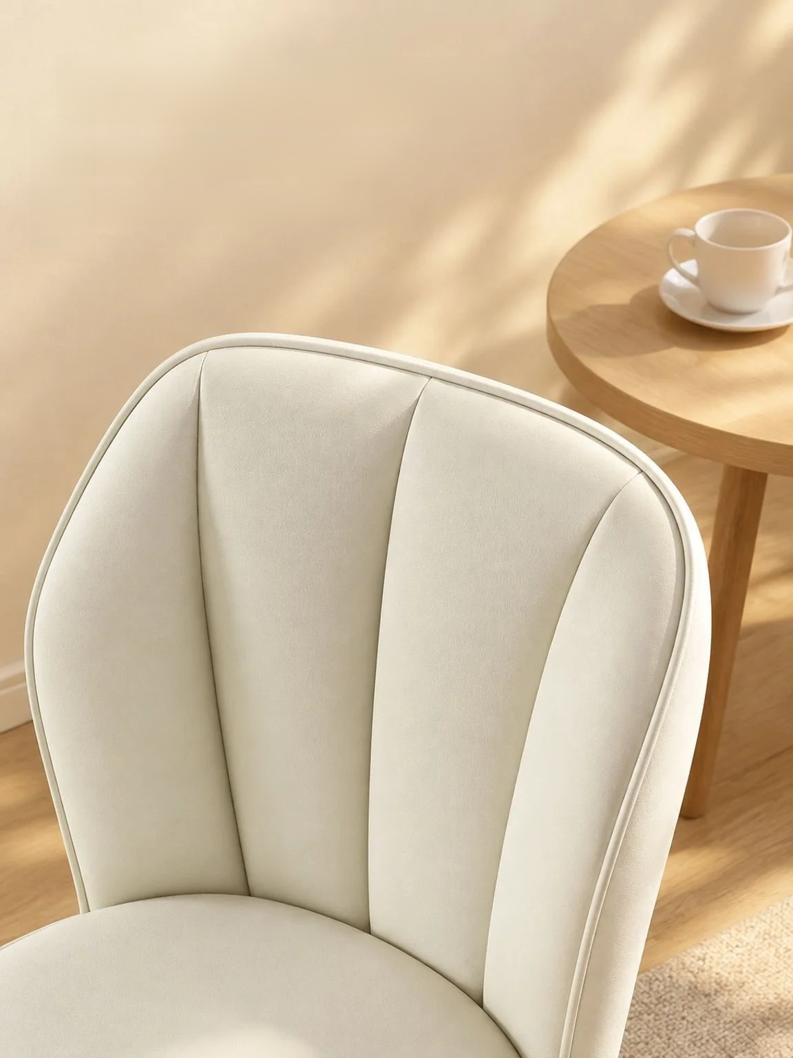 Close-up of the cream upholstery on a modern dining chair