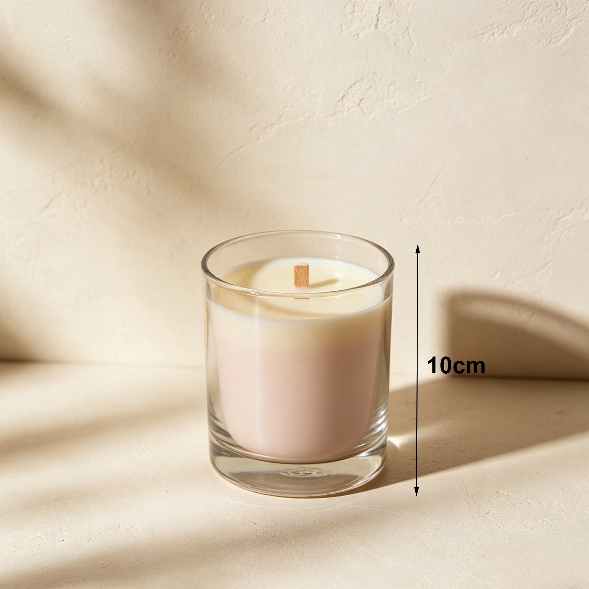 Elegant scented candles in clear glass containers
