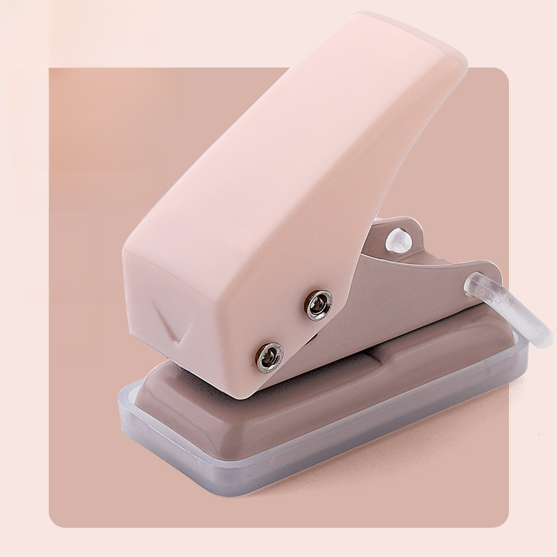 Small manual hole punch