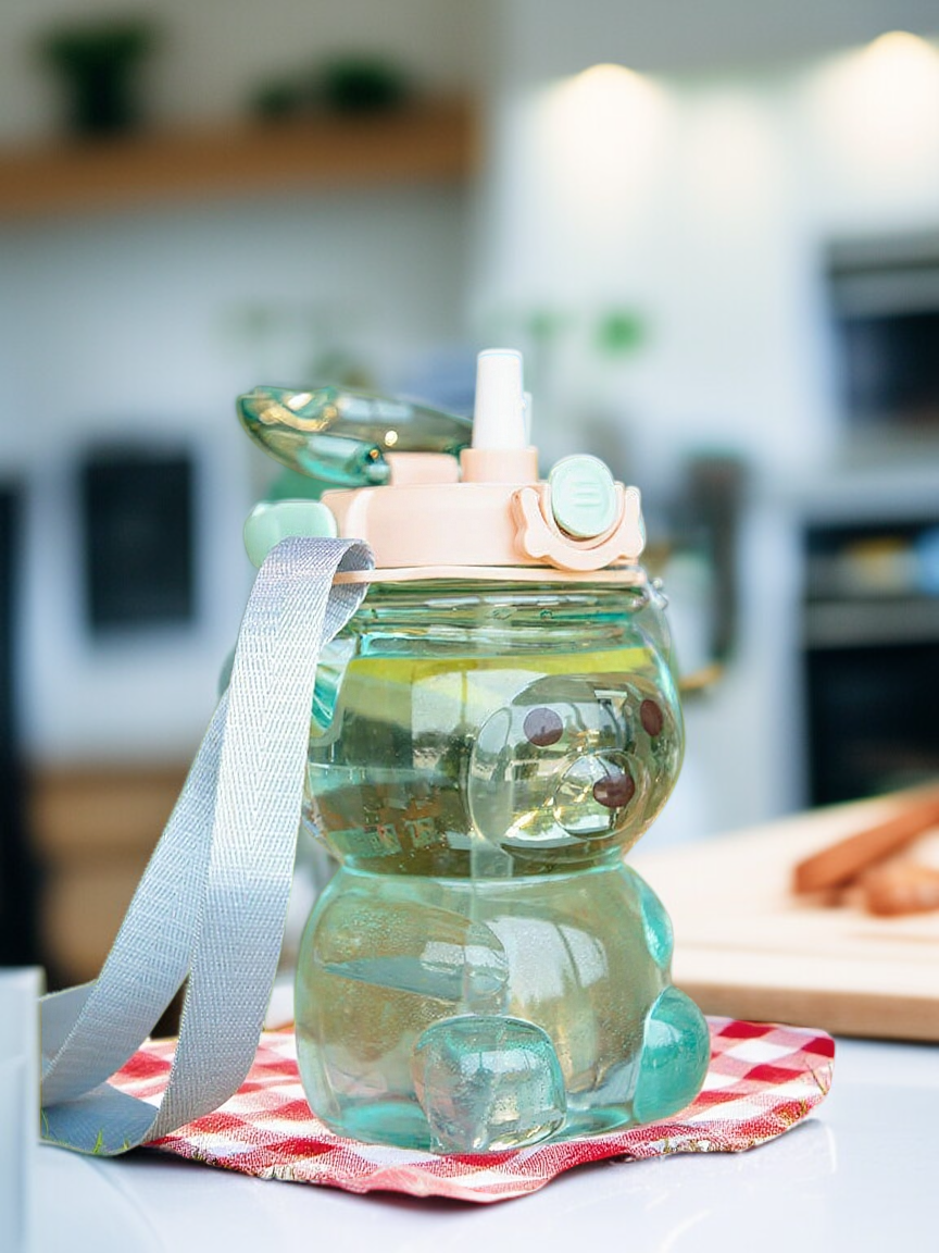 Children holding plastic straw water cups outdoors