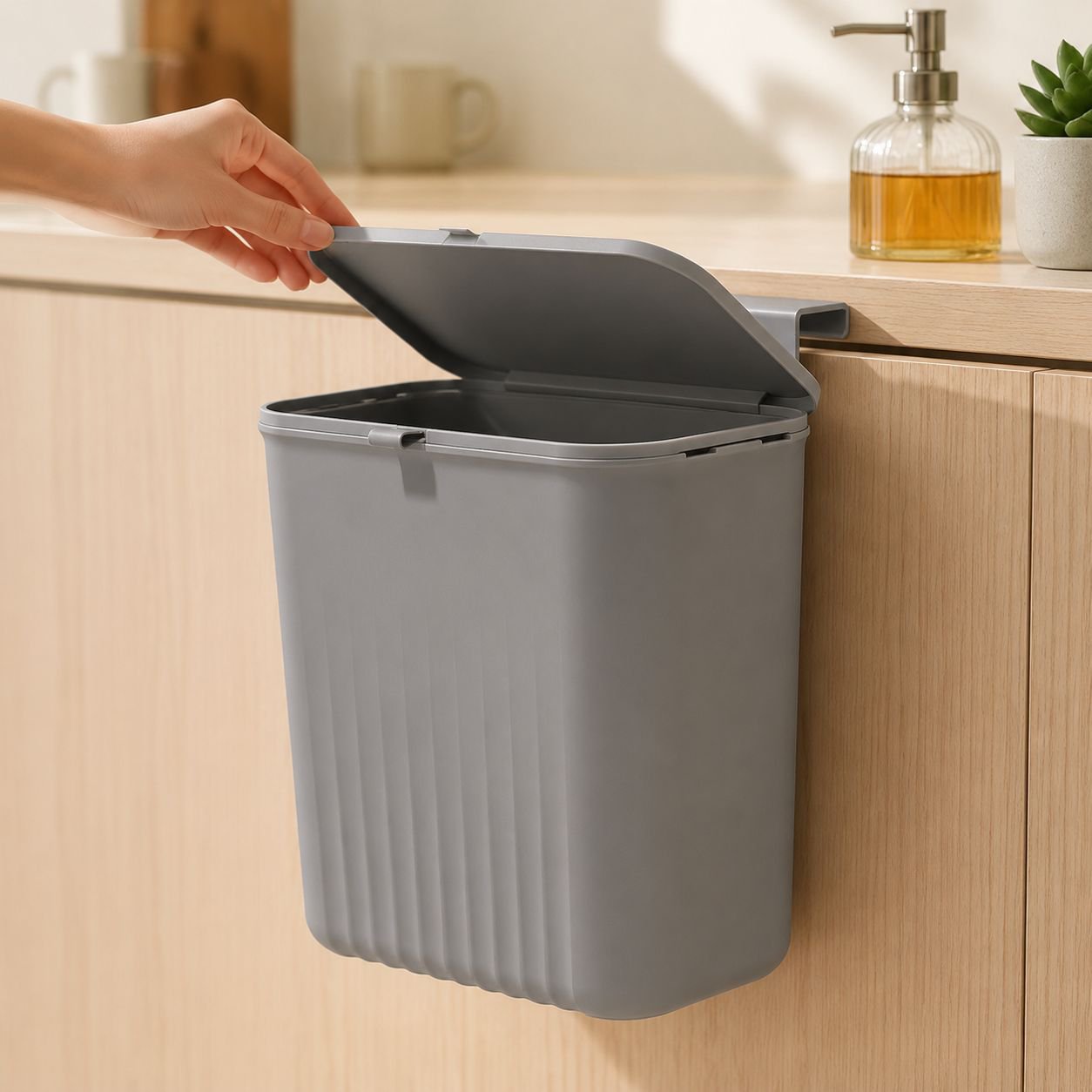 Modern wall-mounted waste bin for bathrooms