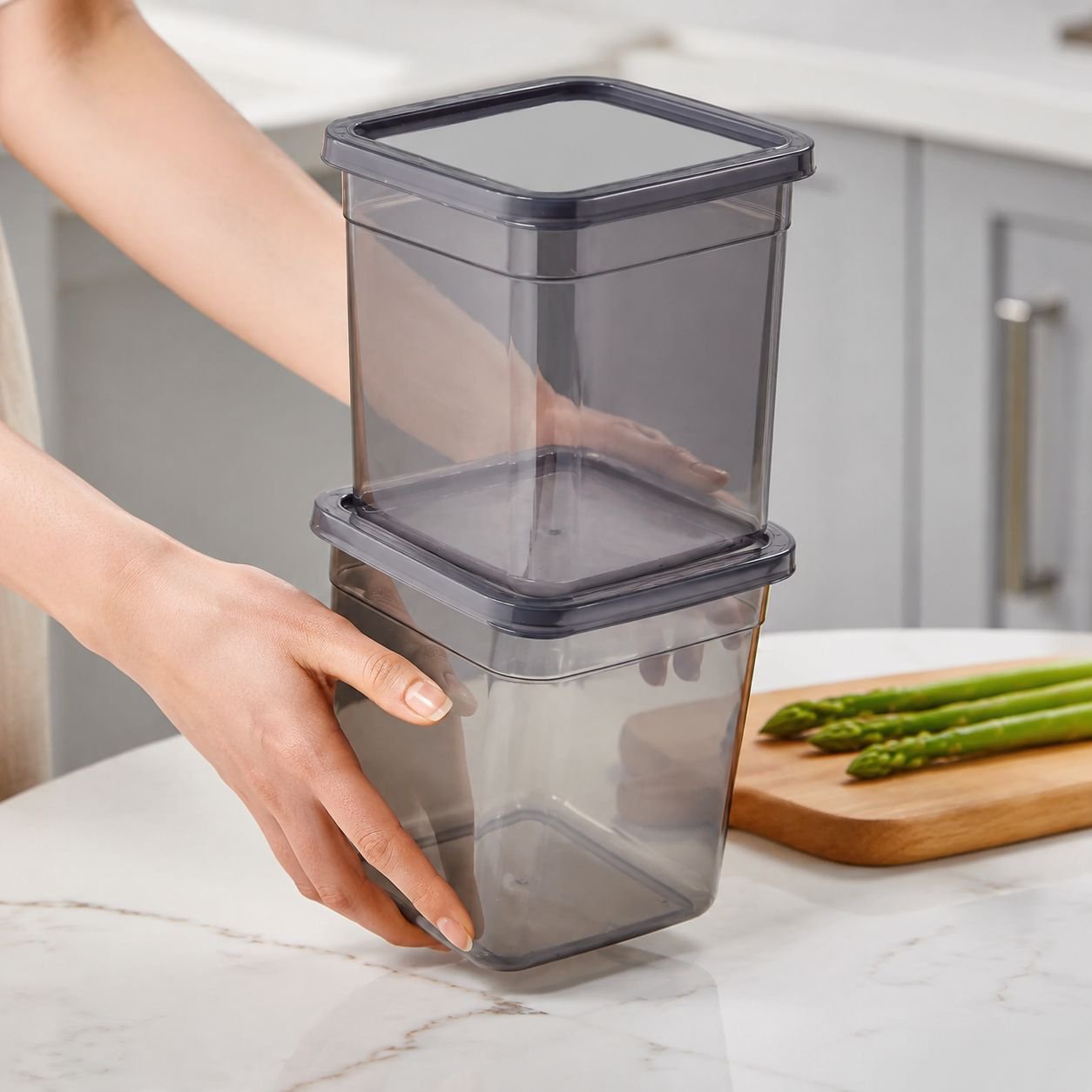 Stackable fridge storage bin with plastic handle in refrigerator