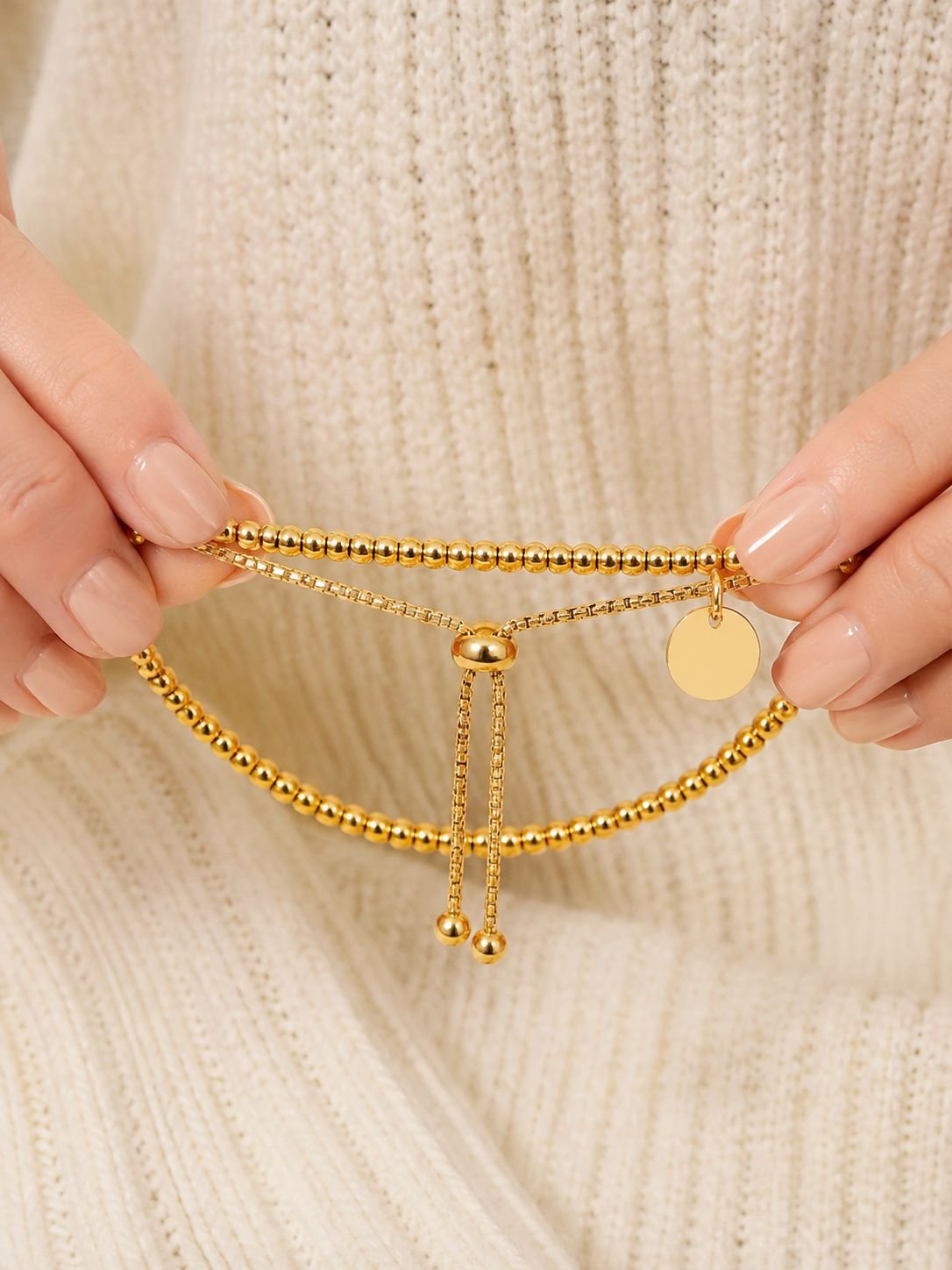 Close-up of the adjustable beaded bracelet mechanism