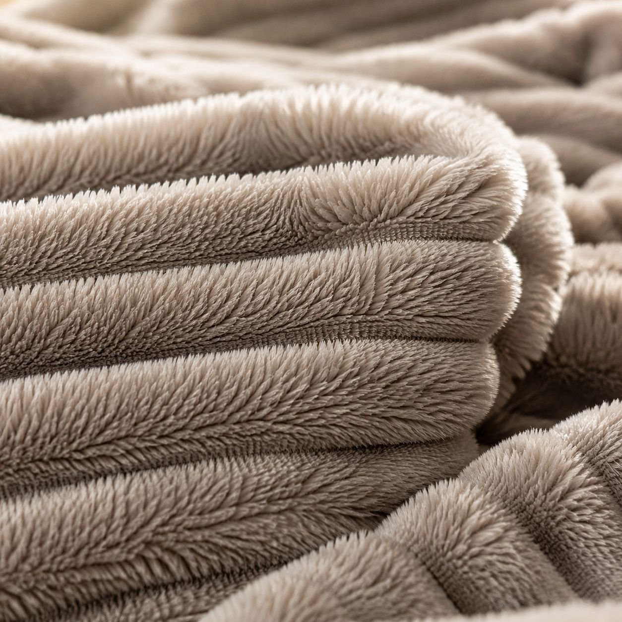 Soft office nap blanket draped over chair