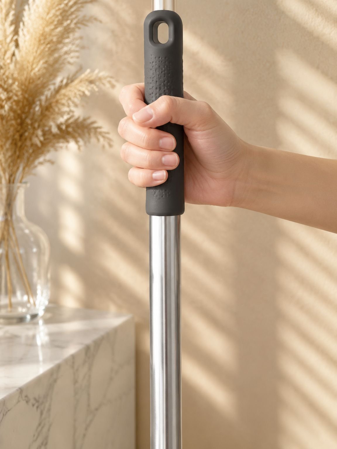 Non-slip, comfortable grip handle on the broom for ease of use