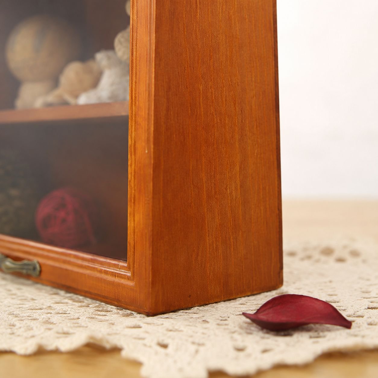 Two-tier vintage wooden makeup organizer with glass display doors