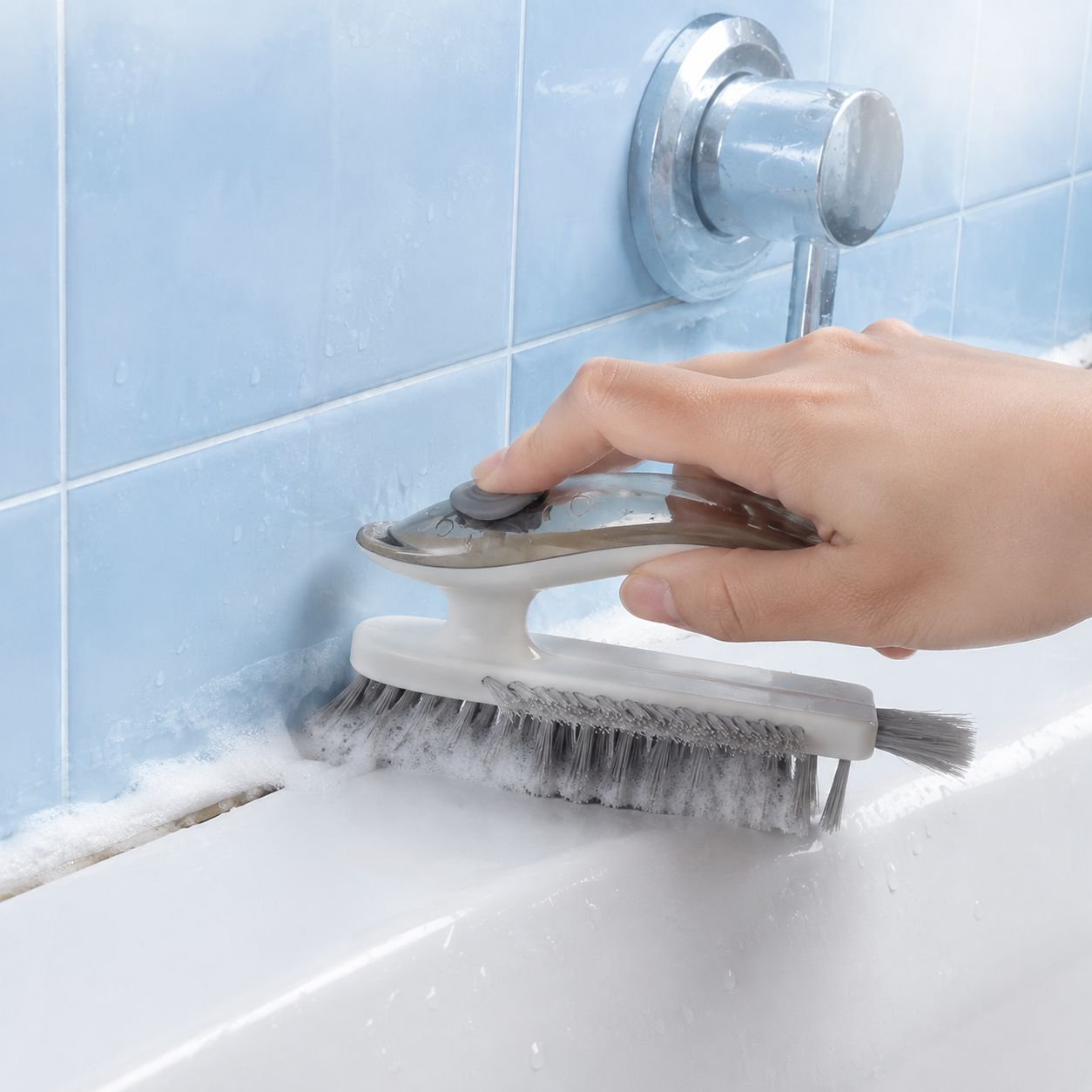 Easy-to-hold grout brush for precise tile cleaning
