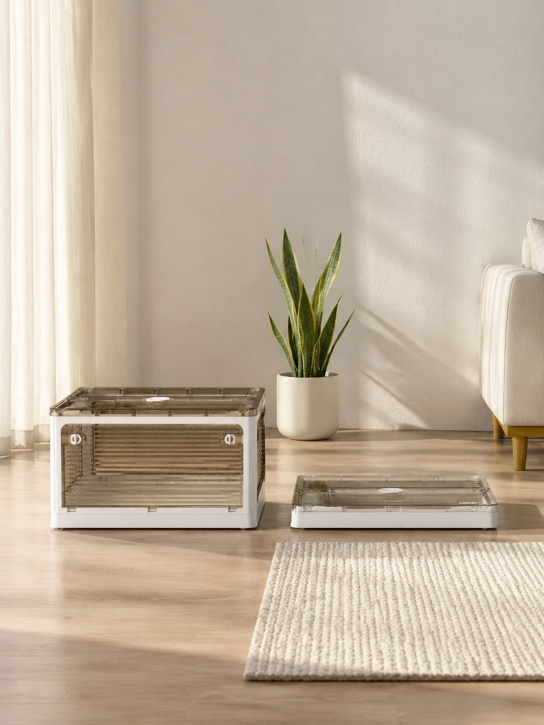 Sturdy plastic storage box with clear panels and wheels