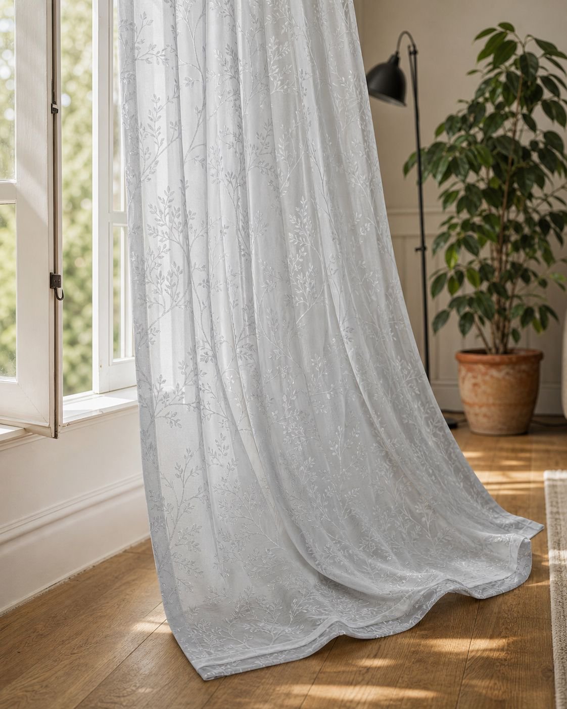 Minimalist blackout curtain paired with transparent sheer