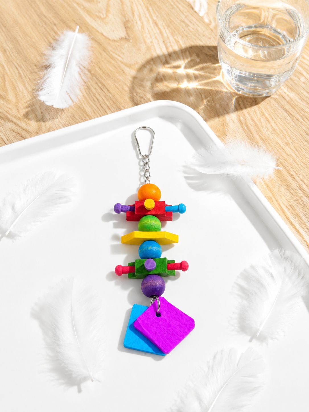 Colorful hanging bird activity toy for cockatiel entertainment
