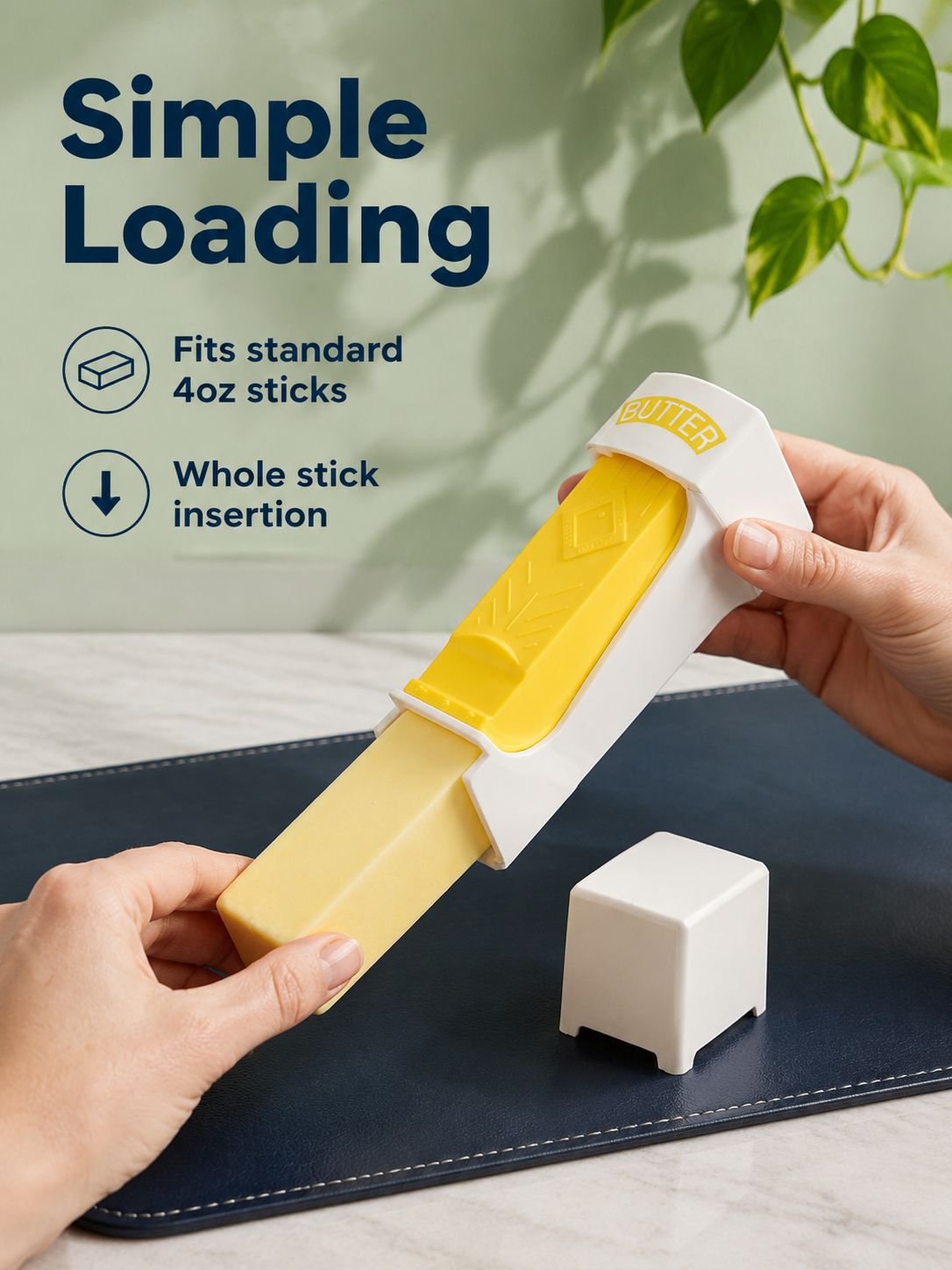 Hand using butter slicer for even butter slices