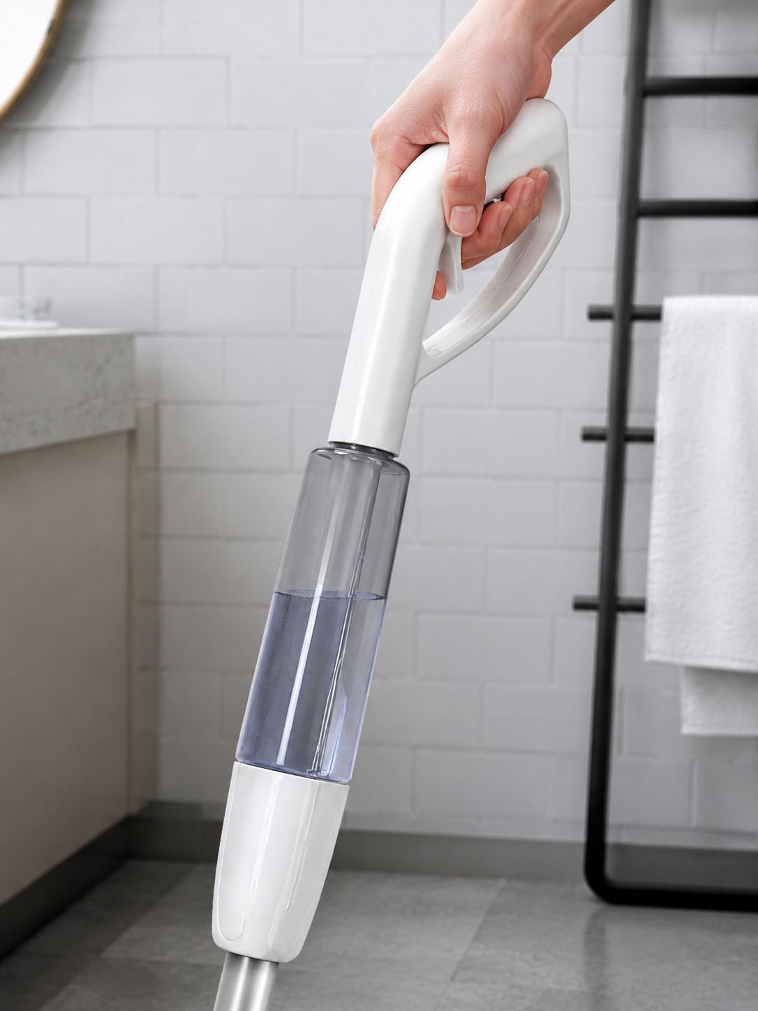 Household squeegee with adjustable water spray feature