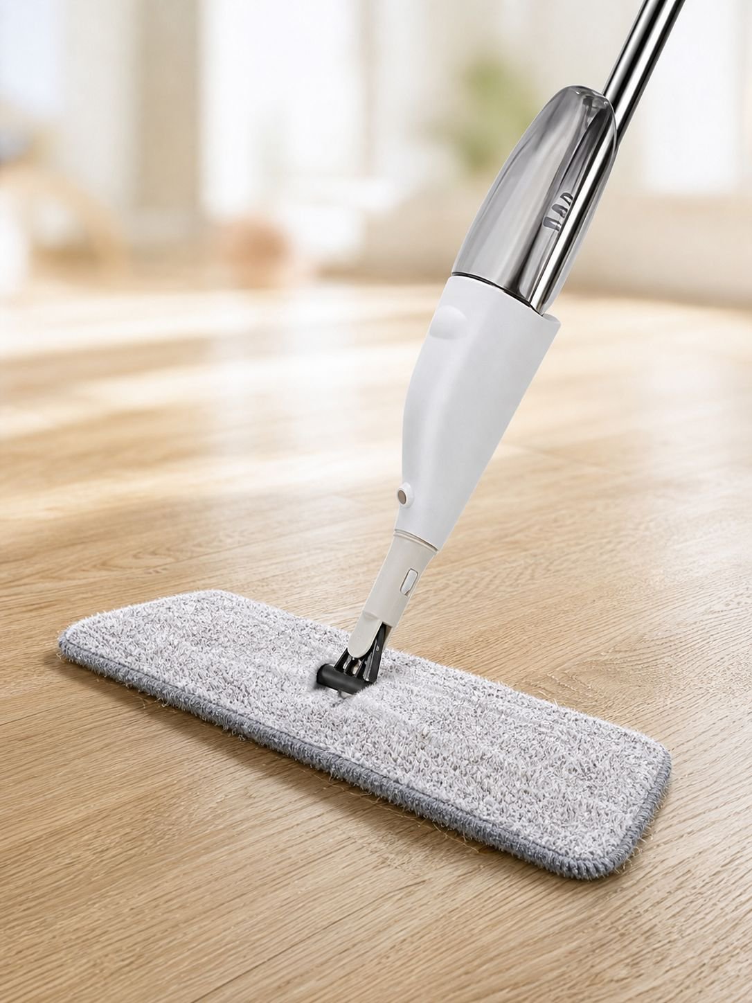 One-Swipe Clean Thick Spray Mop in use on hardwood floor