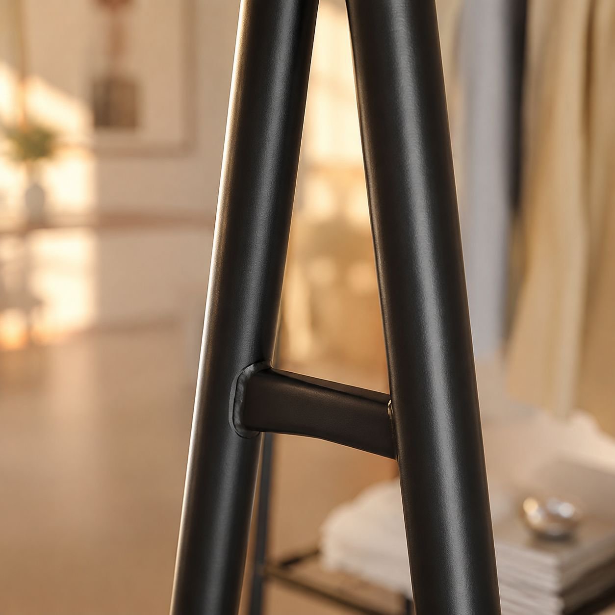 Black metal floor coat rack with storage shelves