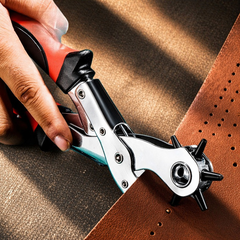 Close-up of adjustable belt hole punch tool