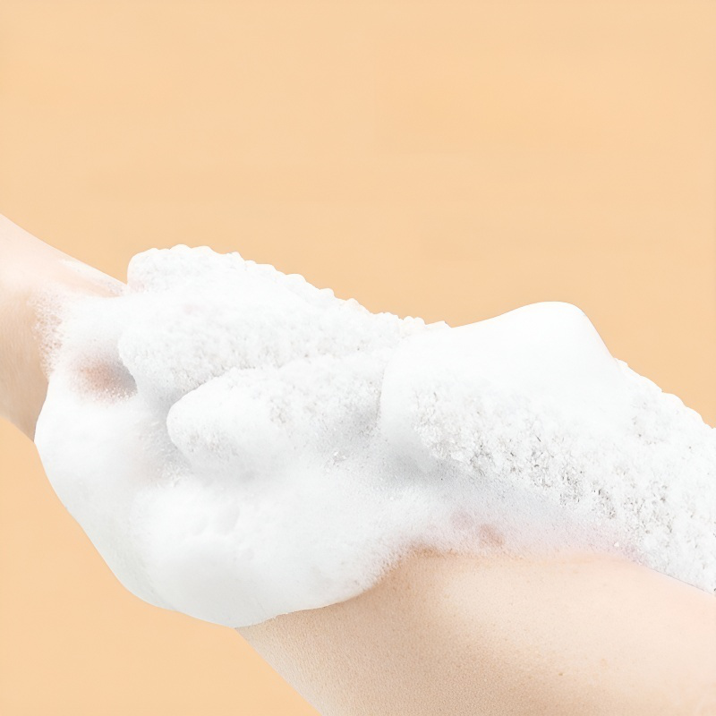 Gant de gommage pour le bain