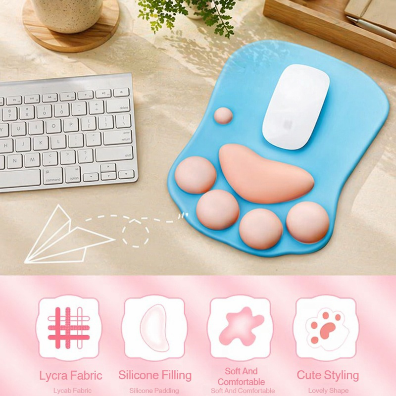 Cute and personalized silicone wrist rest mouse pad with cat paw design for computer laptops.