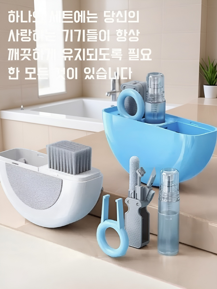 컴퓨터 키보드 청소 중인 브러쉬