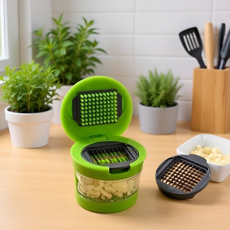 Stainless steel mini garlic press crushing garlic cloves