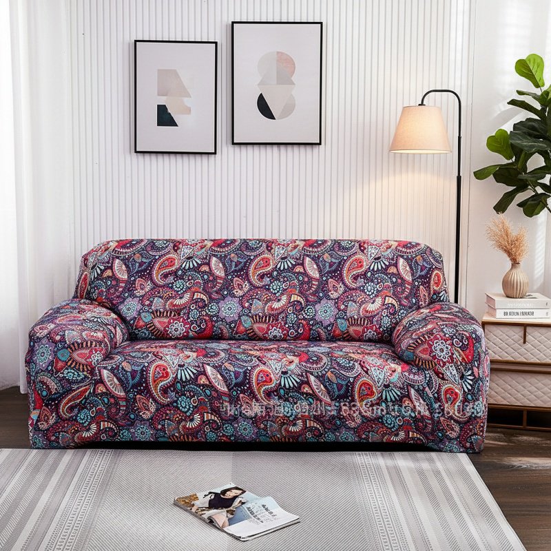 Form-fitting elastic sofa cover in colorful design