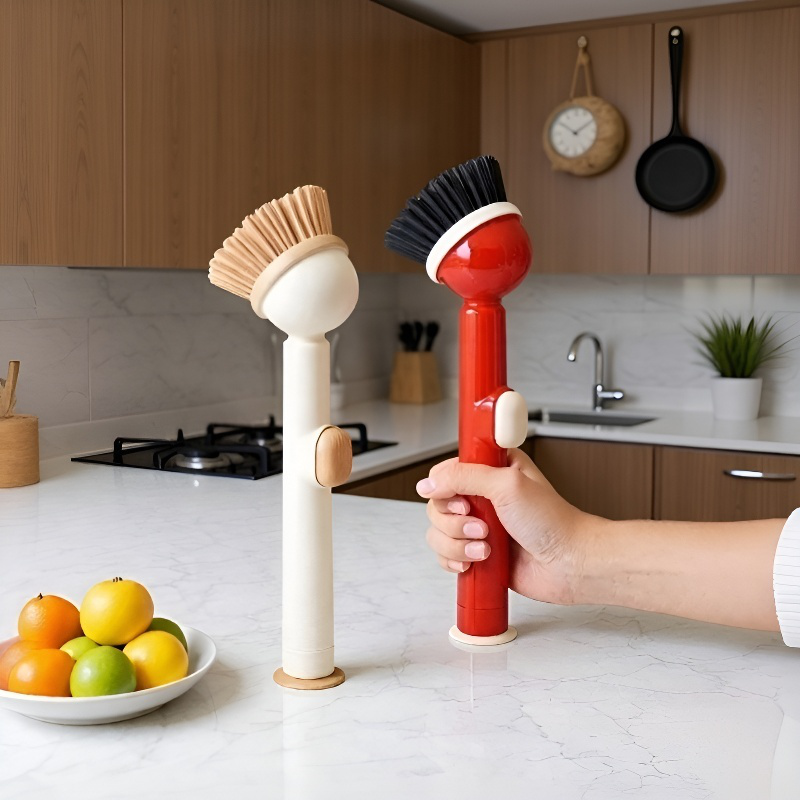 Cepillo de limpieza para utensilios de cocina en uso