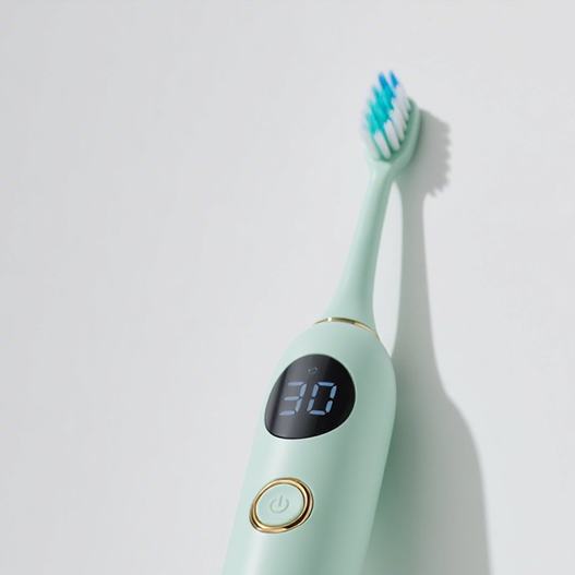 Čistý polymerový elektrický zubní kartáček