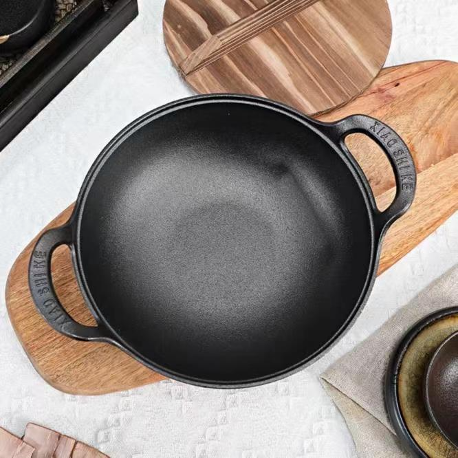 กระทะเหล็กหล่อที่อุ่นไว้ก่อนแล้ว