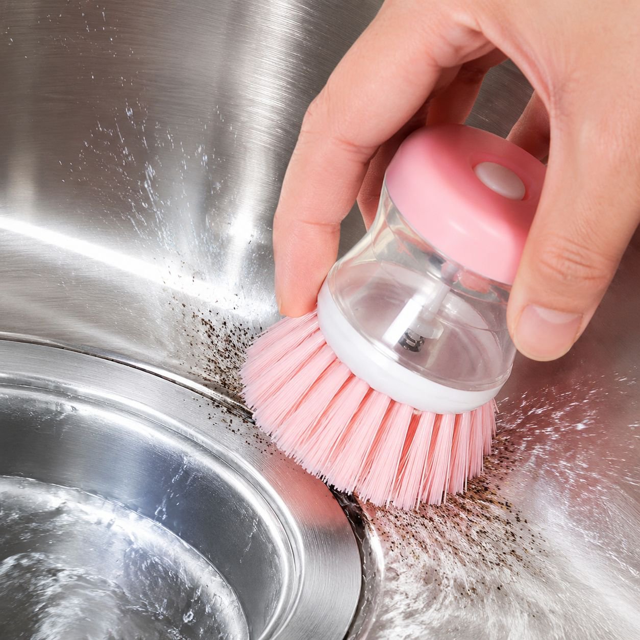 Removing tough stains with smart kitchen brush