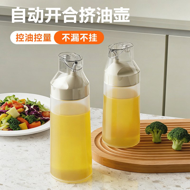 Botella dispensadora de aceite con apertura automática