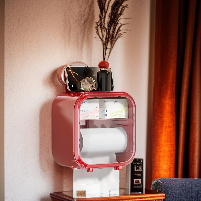 화장실 벽에 부착된 빨판 티슈케이스