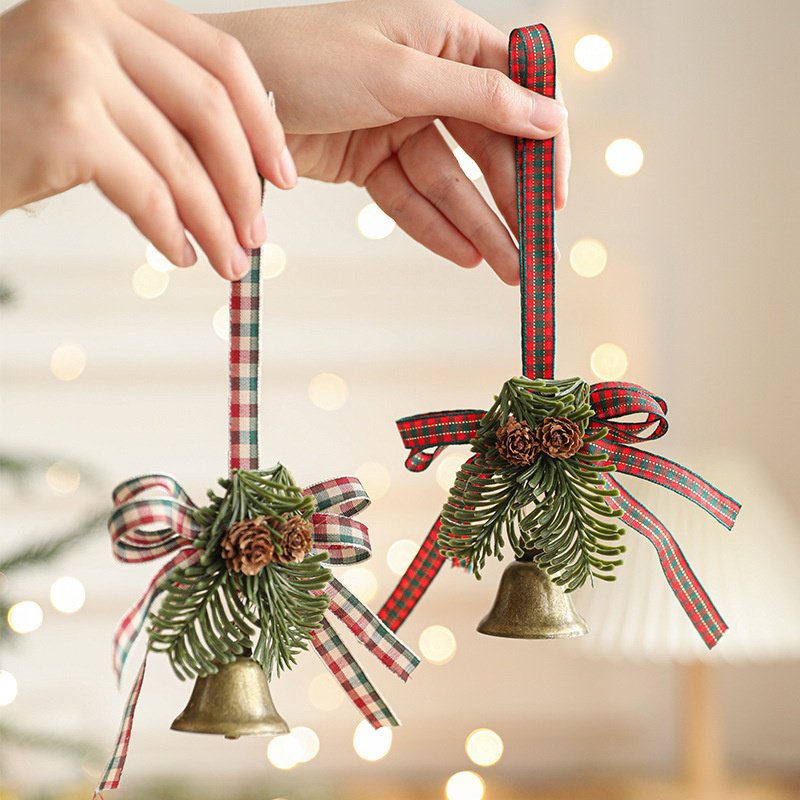 Holiday metal bell and bow ornament