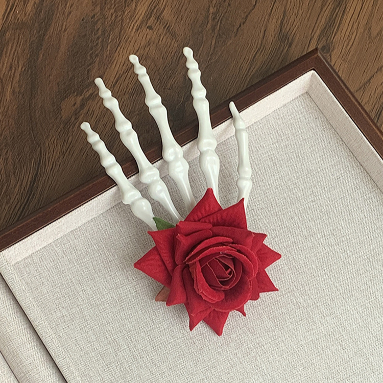 Horquilla de calavera con hueso de mano