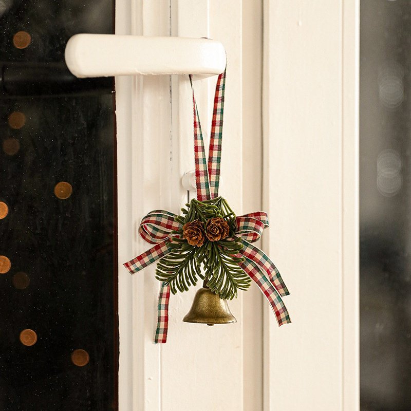 Holiday metal bell and bow ornament